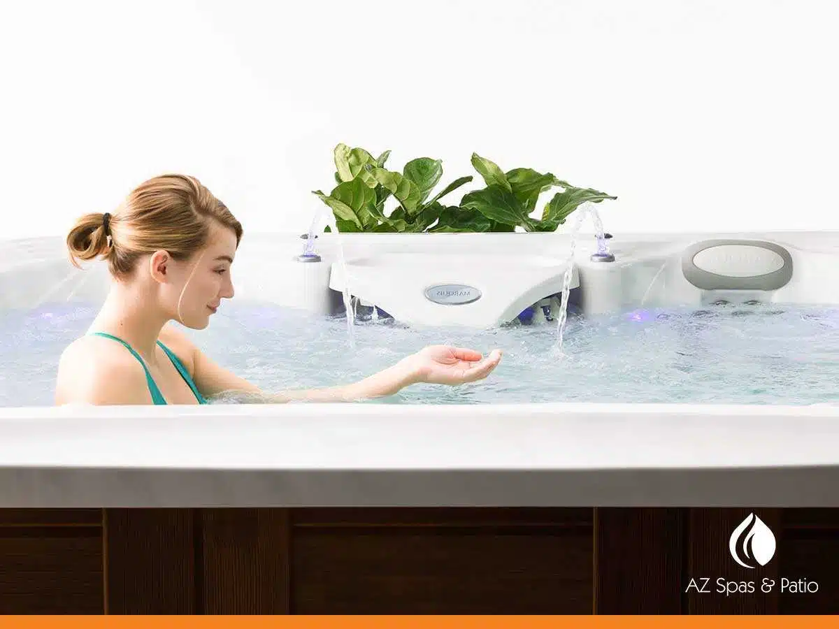 Girl taking a bath in her hot tub at the perfect temperature in Mesa, AZ